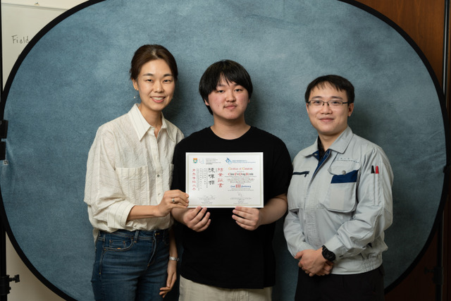 A group photo of Kevin and the researchers (Youngah, Aaron) on completion of the HKSL Lessons. Kevin is given the certificate for attaining Level 3 proficiency.